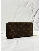 LOUIS VUITTON ZIPPY WALLET IN BROWN MONOGRAM CANVAS