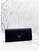 PRADA CONTINENTAL WALLET IN BLACK SAFFIANO LEATHER
