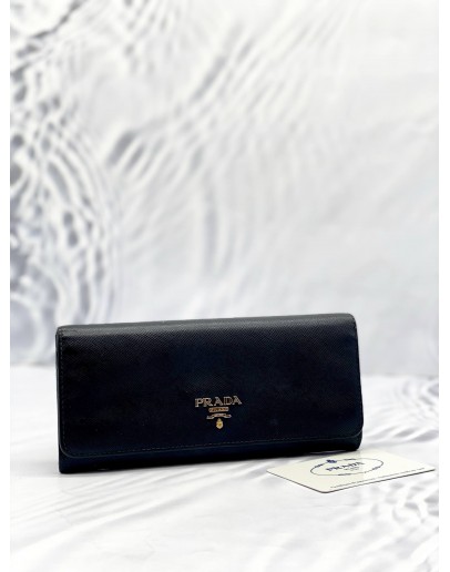 PRADA CONTINENTAL WALLET IN BLACK SAFFIANO LEATHER