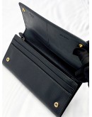 PRADA CONTINENTAL WALLET IN BLACK SAFFIANO LEATHER