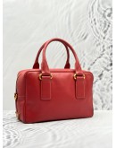 PRADA BAULETTO TOP HANDLE BAG IN RED SAFFIANO LUX LEATHER