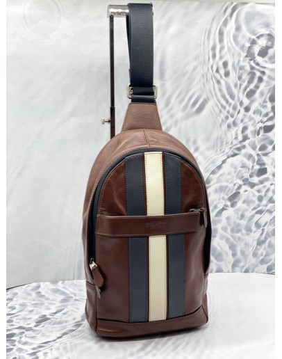 (LIKE NEW) COACH CHARLES VARSITY LEATHER PACK SLING IN DARK SADDLE 