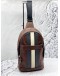 (LIKE NEW) COACH CHARLES VARSITY LEATHER PACK SLING IN DARK SADDLE 