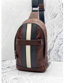 (LIKE NEW) COACH CHARLES VARSITY LEATHER PACK SLING IN DARK SADDLE 