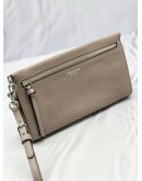 (LIKE NEW)COACH WRISTLETS IN GREY 