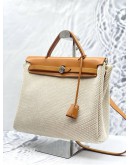 2019 HERMES HERBAG ZIP 31 TOP HANDLE AND SHOULDER BAG IN CANVAS BEIGE AND GOLD VACHE HUNTER LEATHER 