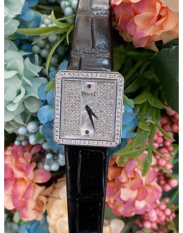 PIAGET 750 WHITE GOLD MOTHER OF PEARL DIAL WITH DIAMONDS AND RUBIES 25MM X 34MM QUARTZ LADIES WATCH