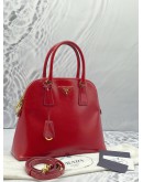PRADA RED SAFFIANO LEATHER LUX HANDLE BAG WITH STRAP
