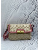 COACH WRISTLET KRISTIN BEIGE SIGNATURE CANVAS PINK LEATHER BAG