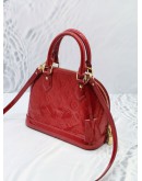 LOUIS VUITTON ALMA BB TOP HANDLE BAG IN RED PATENT LEATHER WITH STRAP