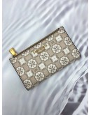 KATE SPADE NEW YORK WOMENS SPADE FLOWER MONOGRAM COATED CANVAS SMALL SLIM BIFOLD BEIGE COLOUR WALLET