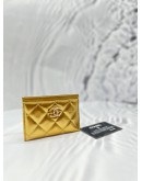 (BRAND NEW) CHANEL QUILTED CARD HOLDER LAMBSKIN GOLD COLOUR WITH GOLD AND PEARL CC LOGO