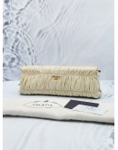 PRADA OFF WHITE GAUFRE LEATHER EAST-WEST FRAME CLUTCH