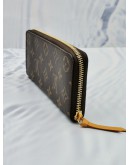 (LIKE NEW) LOUIS VUITTON CLEMENCE LONG WALLET IN BROWN MONOGRAM CANVAS WITH PUMPKIN YELLOW INNER LINING