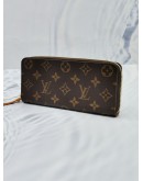 (LIKE NEW) LOUIS VUITTON CLEMENCE LONG WALLET IN BROWN MONOGRAM CANVAS WITH PUMPKIN YELLOW INNER LINING