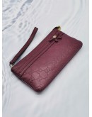 GUCCI BURGUNDY GUCCISSIMA LEATHER ZIPPED POUCH 