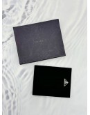 PRADA LOGO PLAQUE WALLET IN BLACK NYLON 