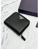 PRADA M522A COMPACT ZIP AROUND WALLET IN BLACK SAFFIANO LEATHER