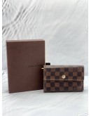 LOUIS VUITTON TRI-FOLD WALLET IN BROWN DAMIER EBENE CANVAS