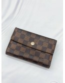 LOUIS VUITTON TRI-FOLD WALLET IN BROWN DAMIER EBENE CANVAS