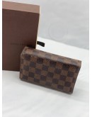 LOUIS VUITTON TRI-FOLD WALLET IN BROWN DAMIER EBENE CANVAS