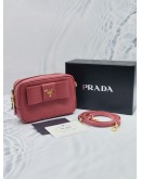 (UNUSED) PRADA BOW RIBBON SAFFIANO LEATHER ZIPPED SMALL CAMERA CROSSBODY BAG IN PINK -FULL SET-