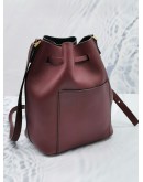 MICHAEL KORS MIRANDA CROSSBODY BUCKET BAG IN BURGUNDY LEATHER