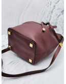 MICHAEL KORS MIRANDA CROSSBODY BUCKET BAG IN BURGUNDY LEATHER