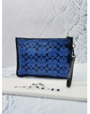 COACH CHARTER POUCH IN SIGNATURE LEATHER IN BLUE BLACK