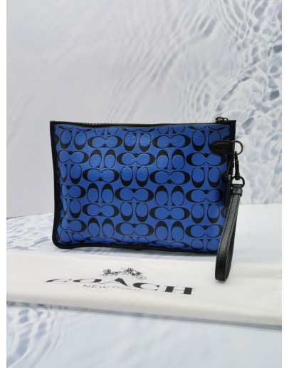 COACH CHARTER POUCH IN SIGNATURE LEATHER IN BLUE BLACK