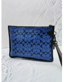 COACH CHARTER POUCH IN SIGNATURE LEATHER IN BLUE BLACK