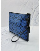 COACH CHARTER POUCH IN SIGNATURE LEATHER IN BLUE BLACK