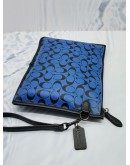 COACH CHARTER POUCH IN SIGNATURE LEATHER IN BLUE BLACK