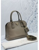 PRADA GREY SAFFIANO LUX LEATHER DOME HANDLE BAG WITH LONG LEATHER STRAP 