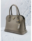 PRADA GREY SAFFIANO LUX LEATHER DOME HANDLE BAG WITH LONG LEATHER STRAP 