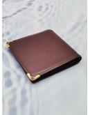 CARTIER MUST DE BI-FOLD WALLET IN DARK MAROON LEATHER