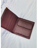 CARTIER MUST DE BI-FOLD WALLET IN DARK MAROON LEATHER