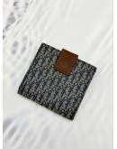 CHRISTIAN DIOR VINTAGE TROTTER COMPACT WALLET IN BLUE DIOR OBLIQUE JACQUARD CANVAS AND BROWN CALF LEATHER