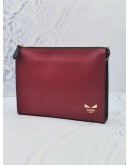 FENDI BUG EYE MOTIF CLUTCH IN RED CALFSKIN LEATHER