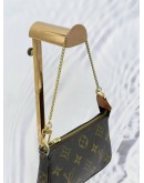 LOUIS VUITTON MINI POCHETTE ACCESSOIRES IN BROWN MONOGRAM CANVAS