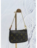 LOUIS VUITTON MINI POCHETTE ACCESSOIRES IN BROWN MONOGRAM CANVAS