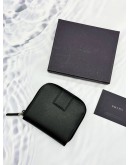 PRADA COMPACT ZIP AROUND WALLET IN BLACK SAFFIANO LEATHER