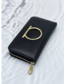 SALVATORE FERRAGAMO GANCINI LONG ZIPPY WALLET IN BLACK CALFSKIN LEATHER