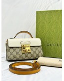 (UNUSED) GUCCI PADLOCK MINI CROSSBODAY BAG IN BEIGE GG SUPREME CANVAS AND WHITE YELLOW LEATHER -FULL SET-