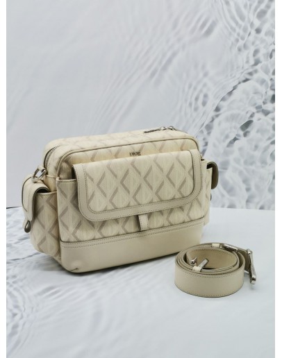 CHRISTIAN DIOR HIT THE ROAD IN CREAM CANVAS / LEATHER MESSENGER BAG 