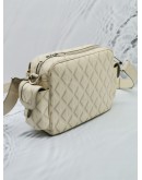 CHRISTIAN DIOR HIT THE ROAD IN CREAM CANVAS / LEATHER MESSENGER BAG 