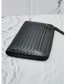 BOTTEGA VENETA INTRECCIATO LEATHER ZIPEED CLUTCH IN BLACK 