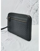 BOTTEGA VENETA INTRECCIATO LEATHER ZIPEED CLUTCH IN BLACK 