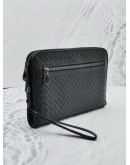 BOTTEGA VENETA INTRECCIATO LEATHER ZIPEED CLUTCH IN BLACK 