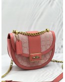 COACH ALIE SADDLE CROSSBODY BAG IN SIGNATURE CANVAS IN PINK 